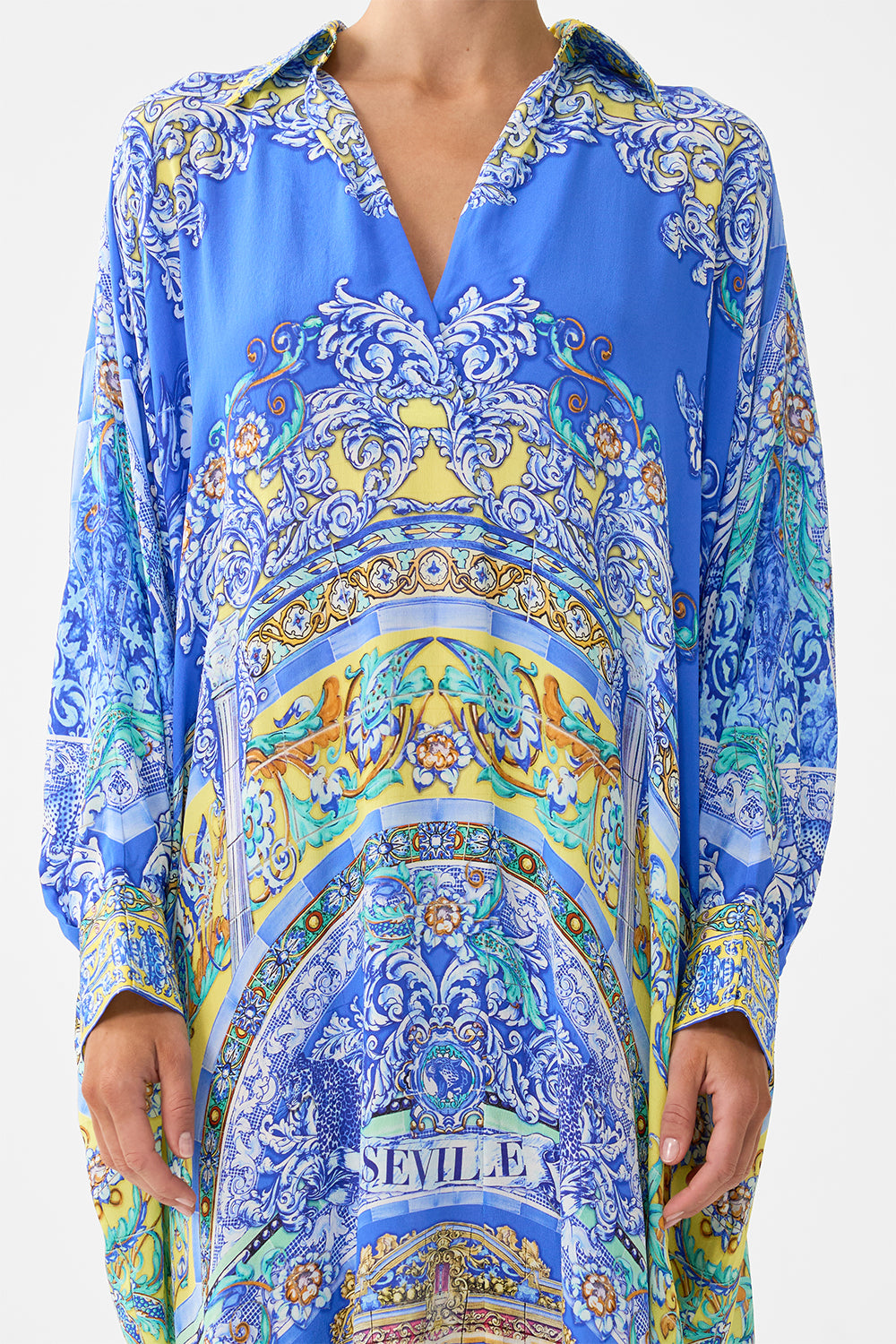 WING COLLAR KAFTAN BENEATH THE ANDALUSIAN SUN