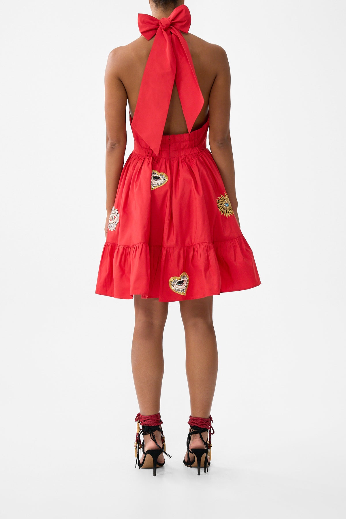 The CAMILLA RUFFLE HEM HALTER SHORT DRESS NAZAR NIRVANA