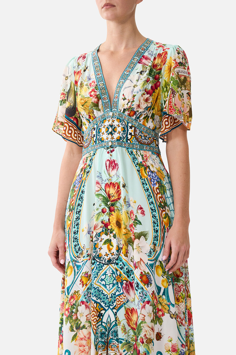 SHAPED WAISTBAND DRESS WITH FLUTTER SLEEVES MAGIC OF THE MERCADO