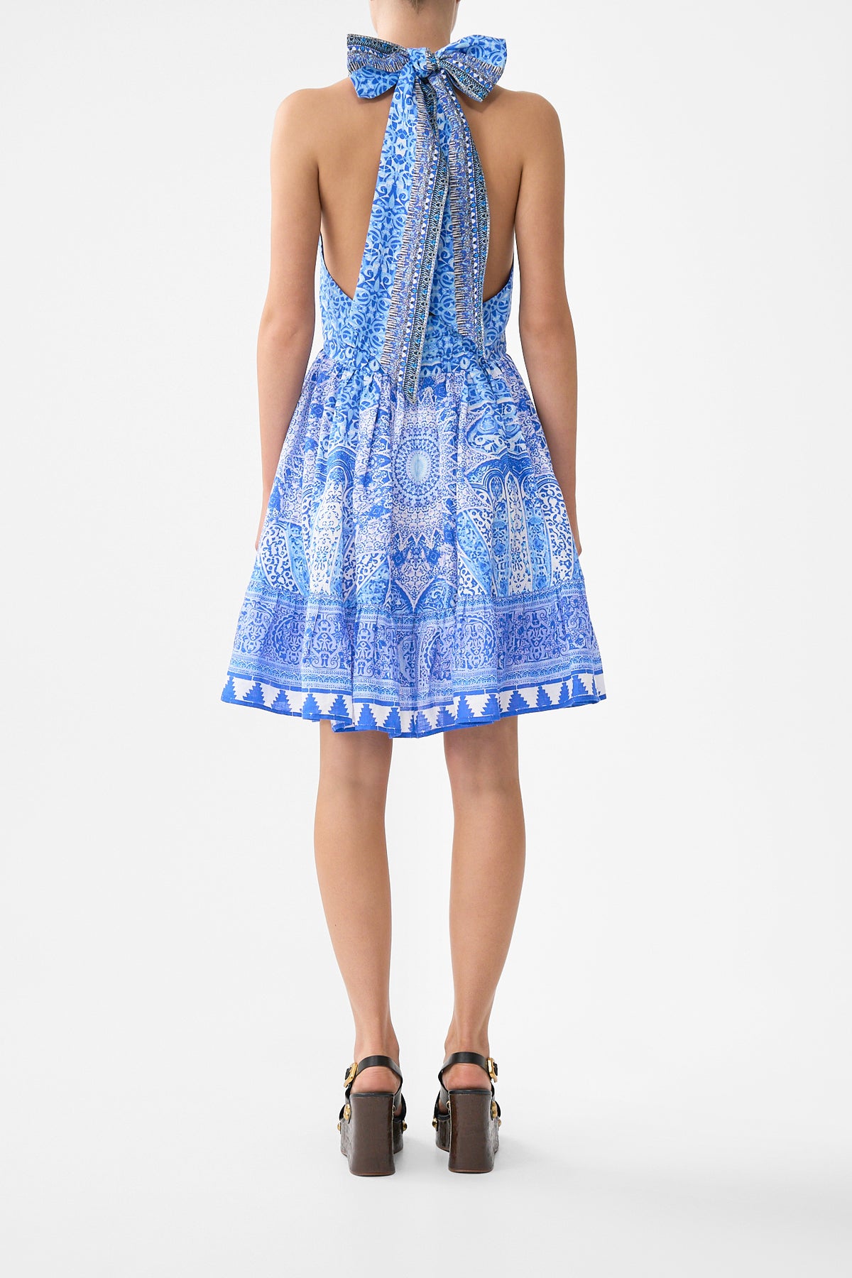 The CAMILLA RUFFLE HEM HALTER SHORT DRESS THE BOSPHOROUS