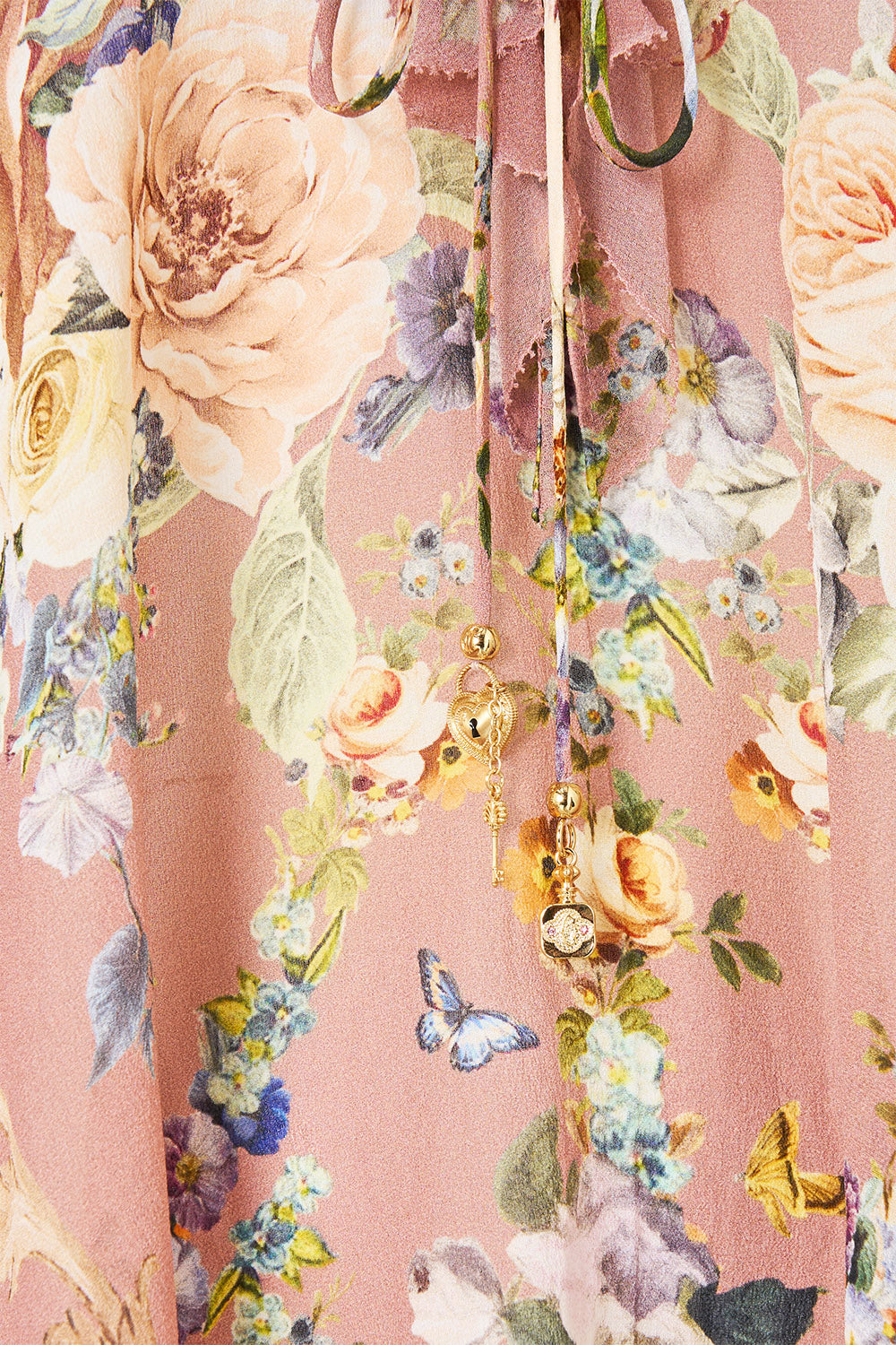 LACE UP V NECK BLOUSE WITH CASCADE RUFFLES CHAMBER OF BLOOMS
