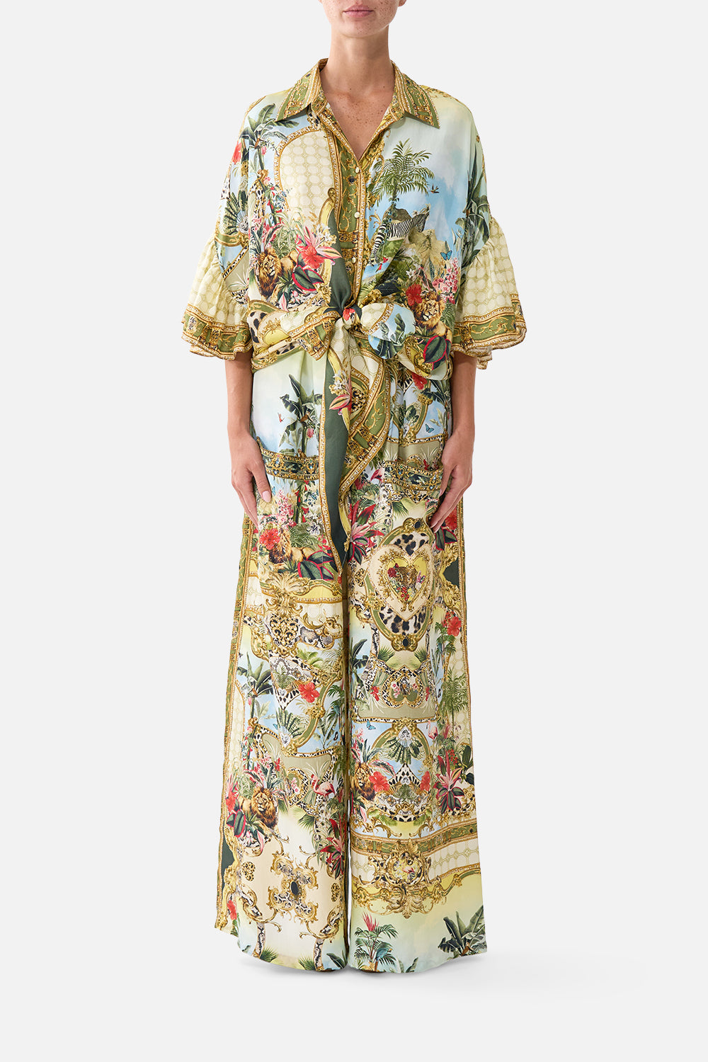 The CAMILLA TIE FRONT SHIRT WITH SLEEVE FRILL WANDERLUST EMPIREWANDERLUST EMPIRE