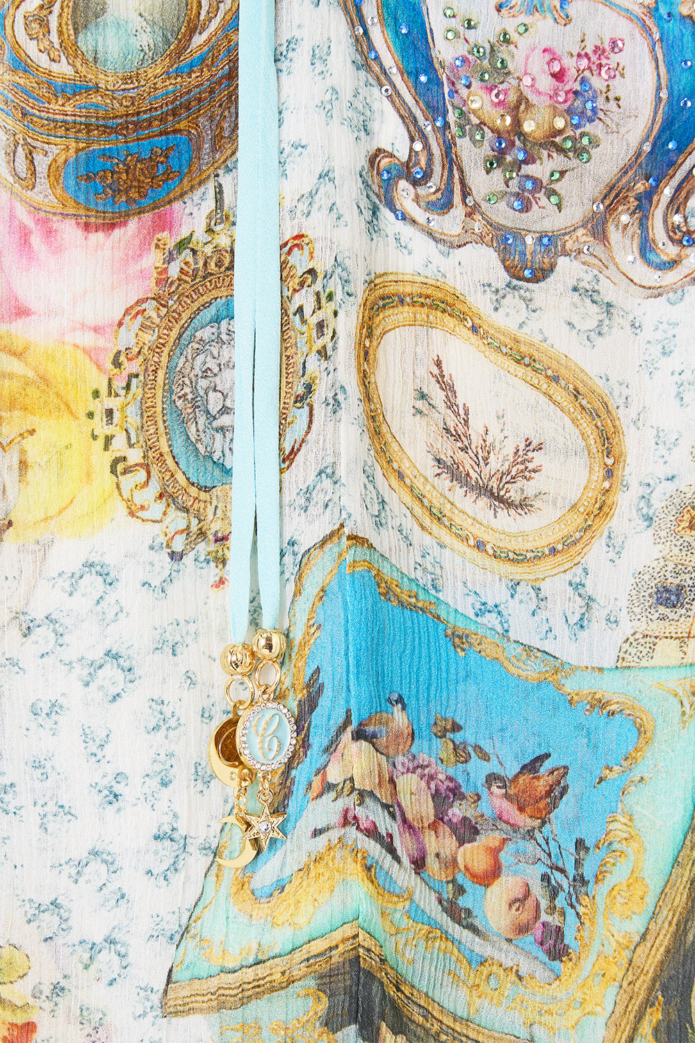 The CAMILLA Curved Hem Ruffle Dress in our Art For The Artisans print.