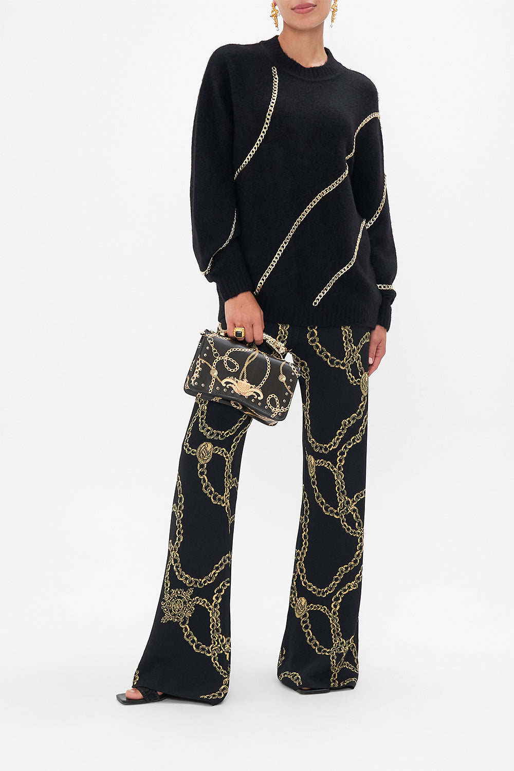 Front view of model wearing CAMILLA knit jumper in Tether Me Not print