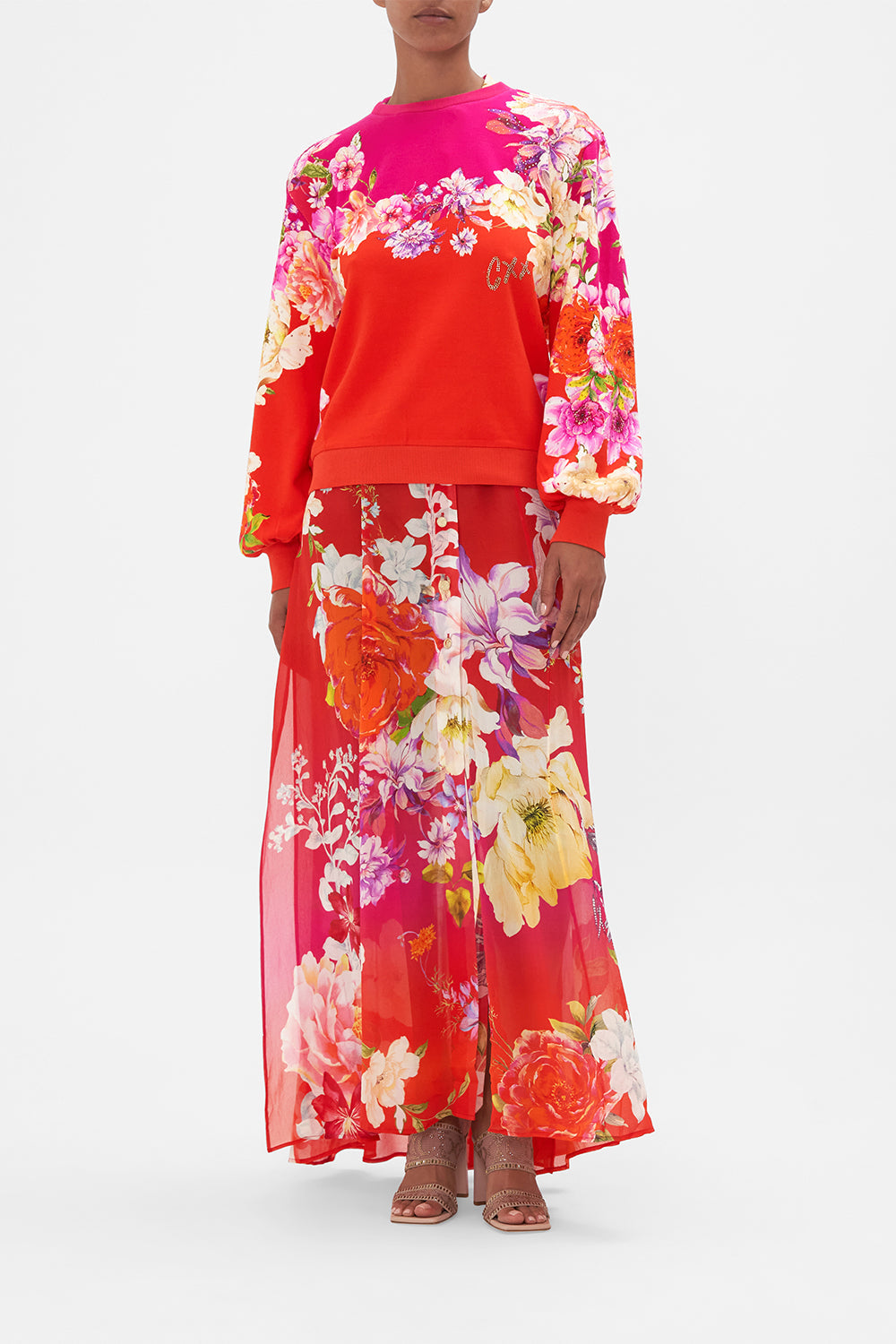 Front view of model wearing CAMILLA floral bikini sweater in Kiss And Tell print