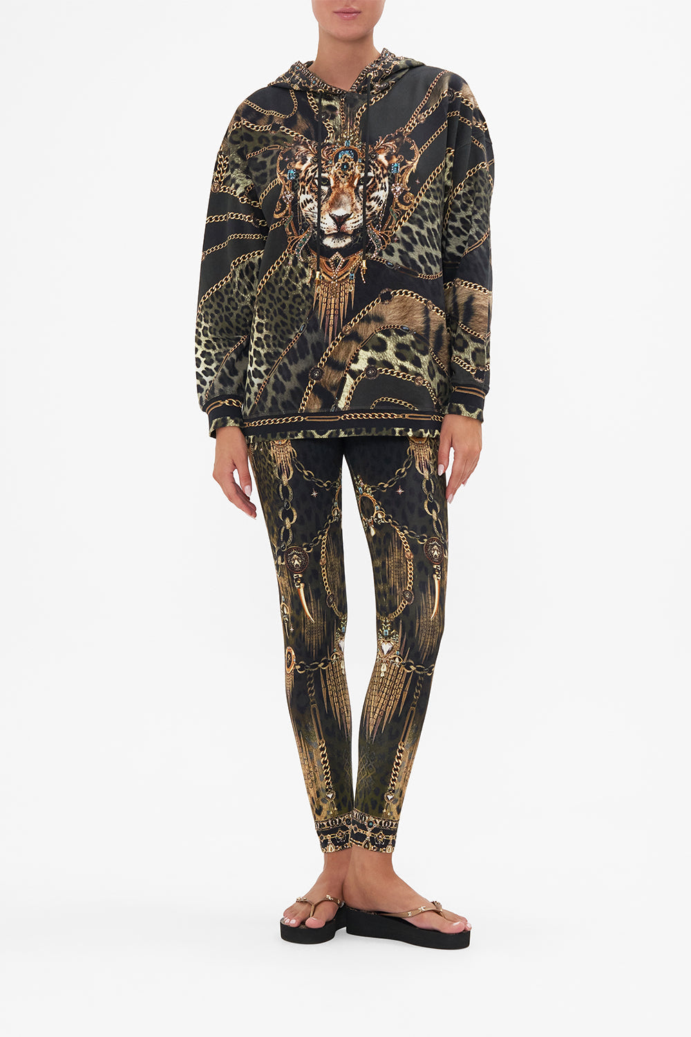 Front view of model wearing CAMILLA hoody with pocket in Lions Mane print