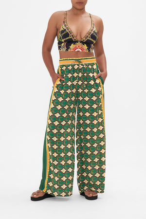 Front view of model wearing CAMILLA silk printed pants in Jealousy And Jewels print