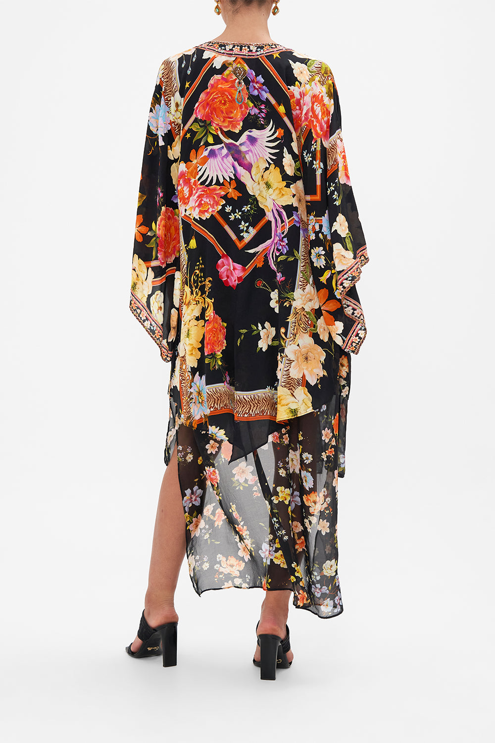 Back view model wearing of CAMILLA floral silk kimono layer in Secret History print